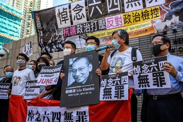 Leading Hong Kong activists charged for Tiananmen vigil gathering