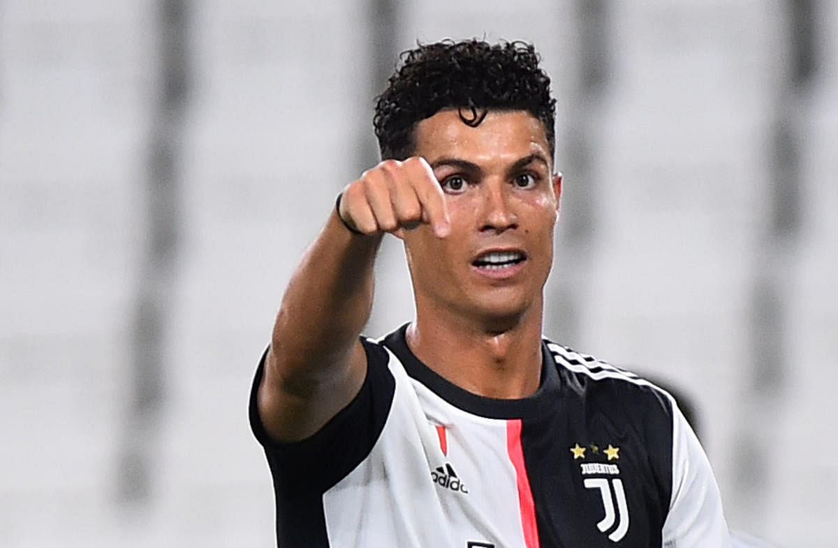 Ronaldo double puts Juventus on brink of nine in a row