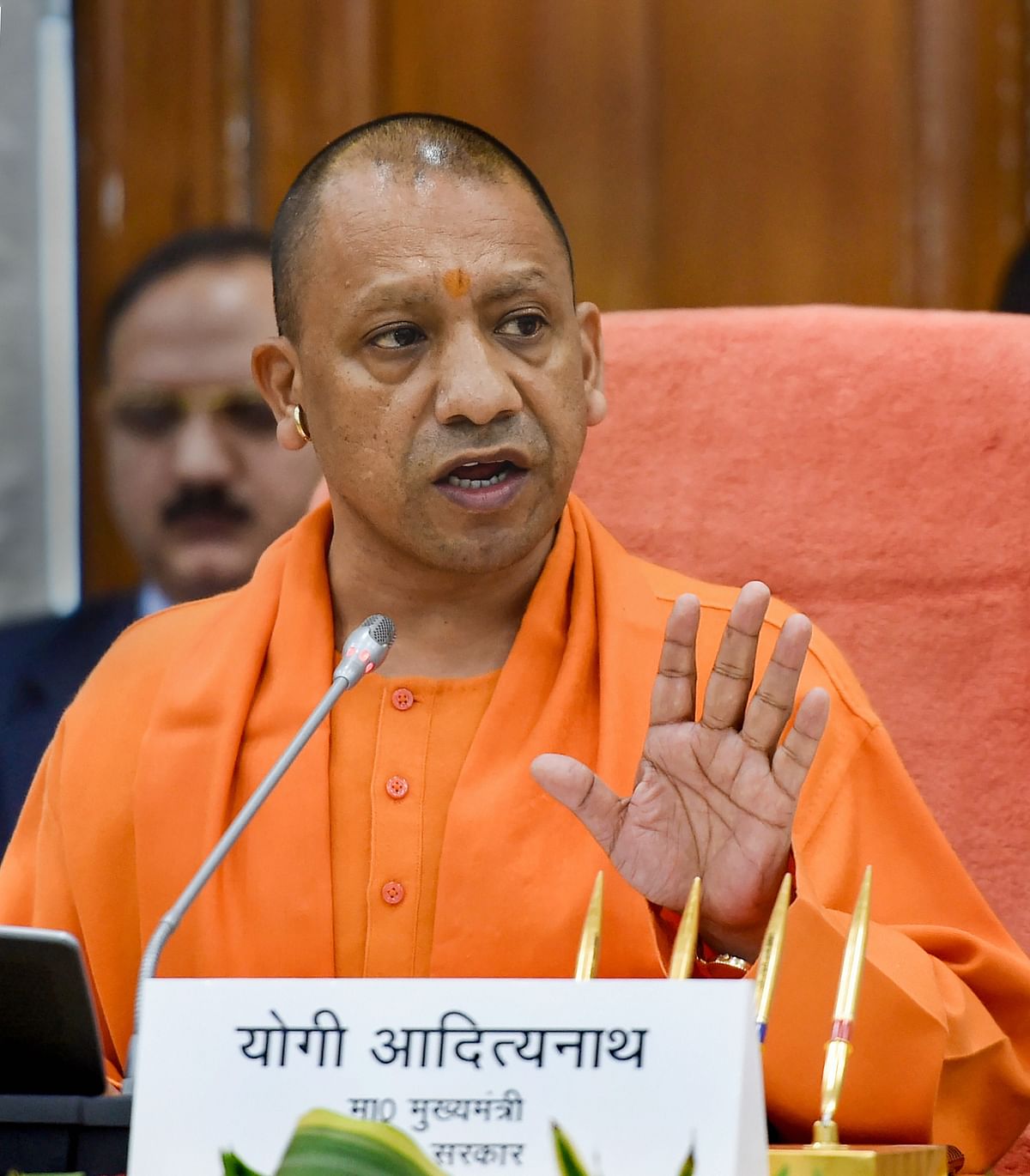 Raise daily Covid-19 testing to 1 lakh, conduct door-to-door survey in 7 dists: Yogi to officials