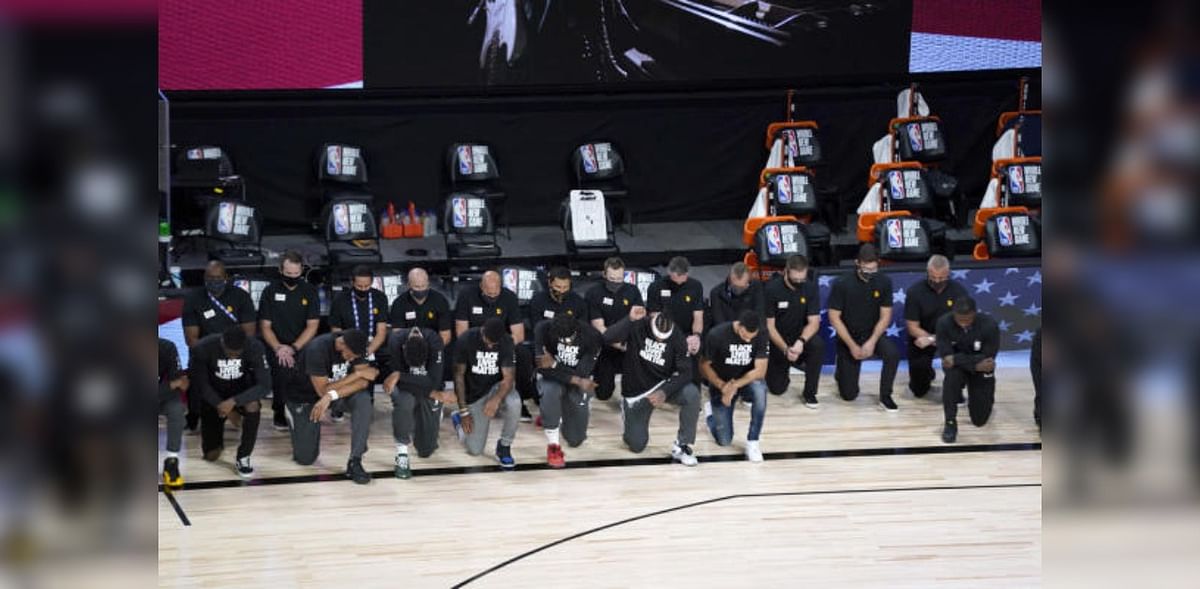 NBA players protest racial injustice as league returns 