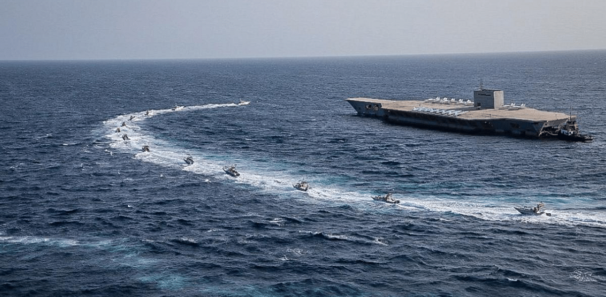 US says Iran forces board ship in international waters