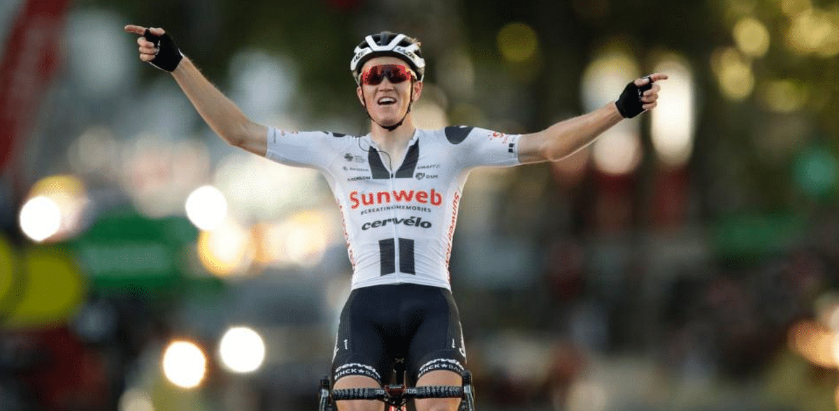 Kragh Andersen wins stage 14, Roglic retains Tour lead
