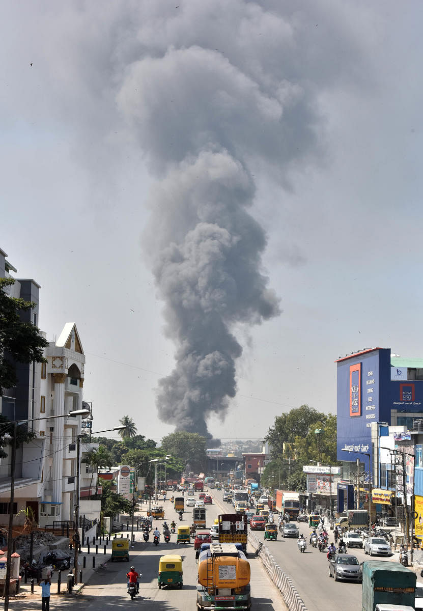The thick cloud of smoke could be seen from afar. DH PHOTO/JANARDHAN B K