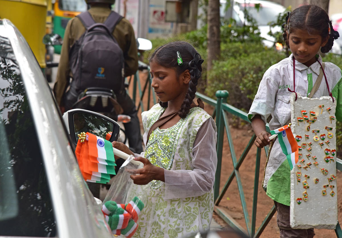Hold survey of kids selling flowers, toys at Bengaluru traffic junctions: HC tells govt