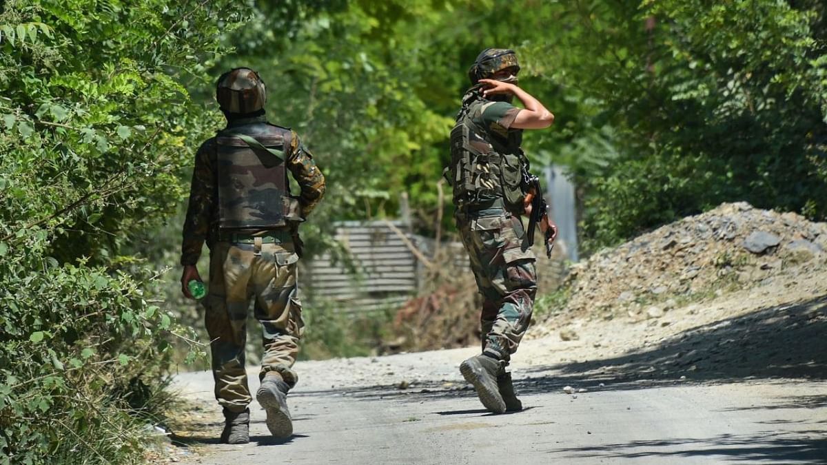Two militants trapped during encounter with security forces surrender in J&K's Pulwama