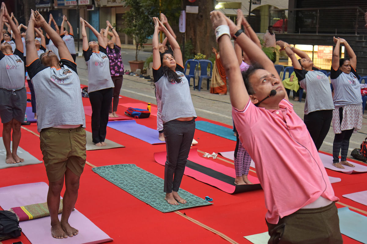 On Rathasapthami, yoga practitioners perform 108 Surya Namaskaras