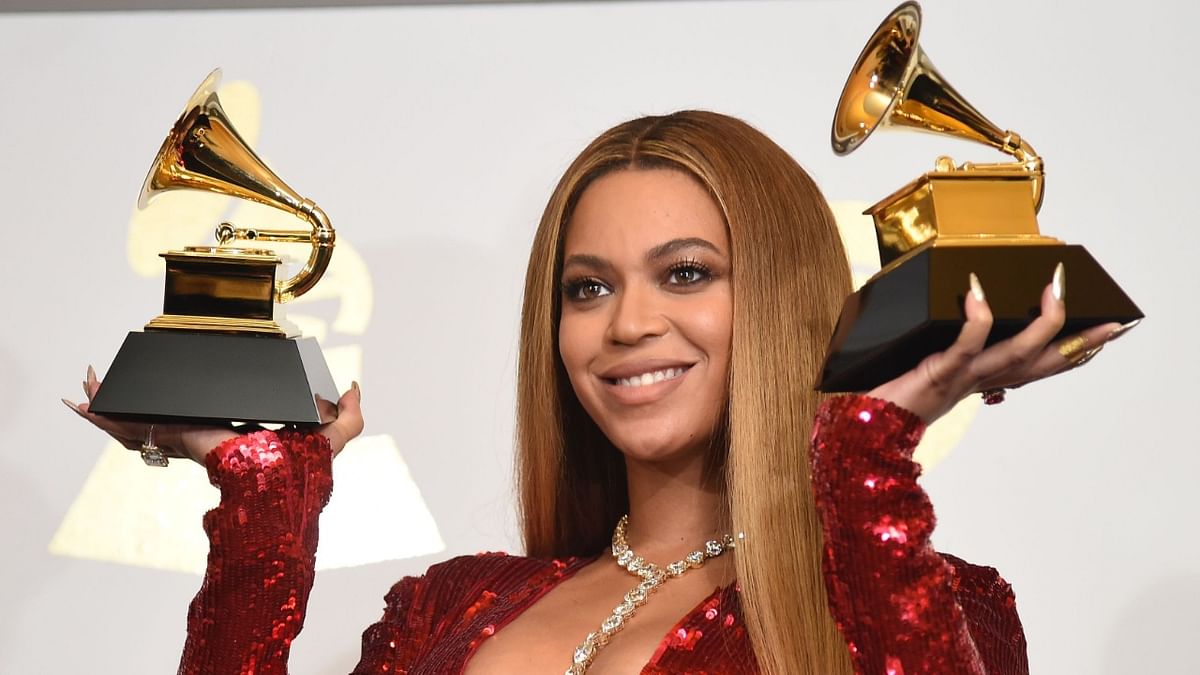Music world to honor its best at toned down Grammys
