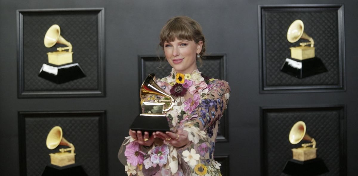 Taylor Swift wins Grammy for album of the year, becomes first woman to receive top honour thrice