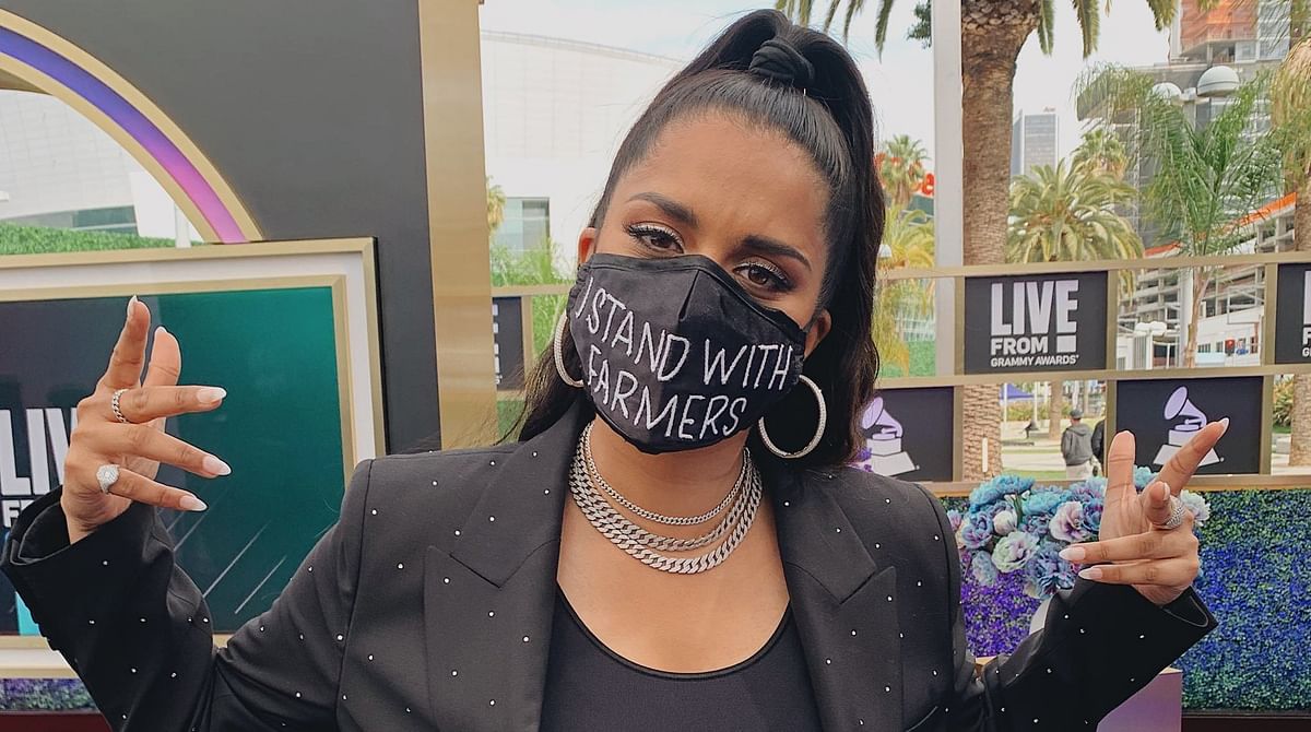 Lilly Singh wears 'I stand with farmers' mask at Grammys red carpet