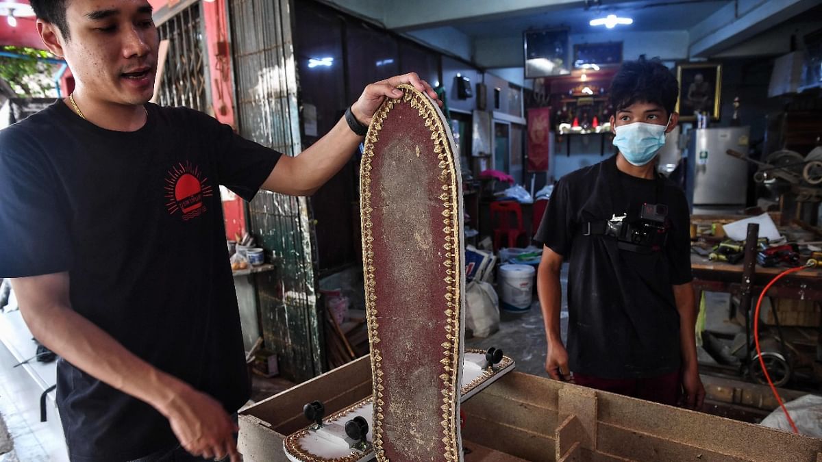 Thai coffin-maker kickflips his caskets into skateboards