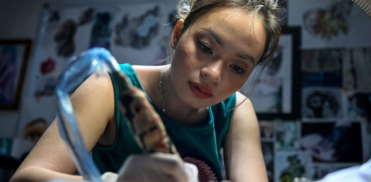 Tattoos, taboo and trauma: Vietnamese artist inks women in search of healing