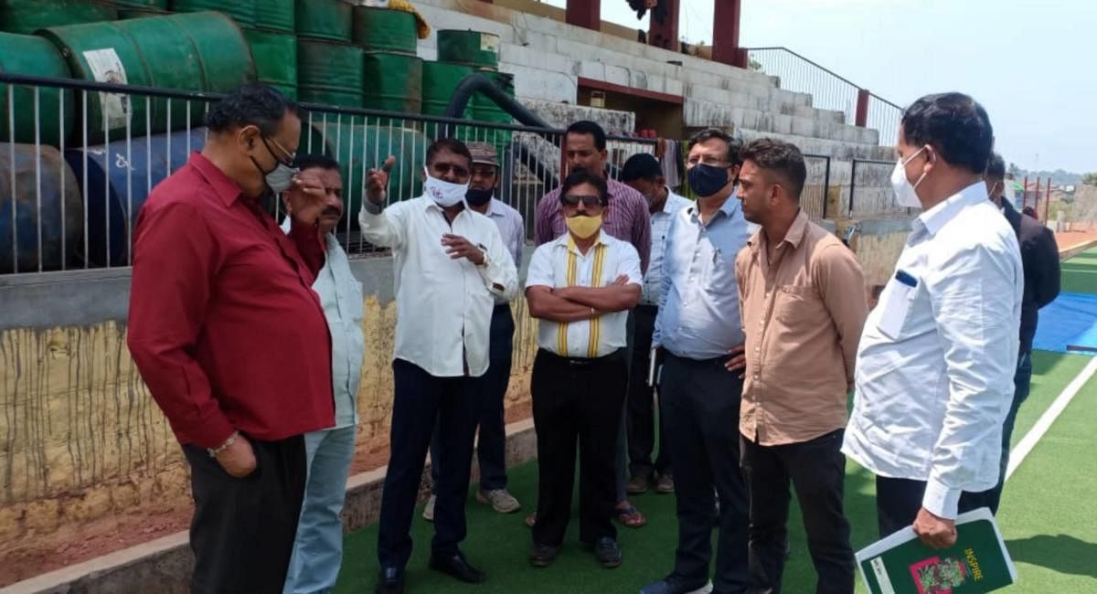 Sports authority vice-president inspects turf ground in Somwarpet