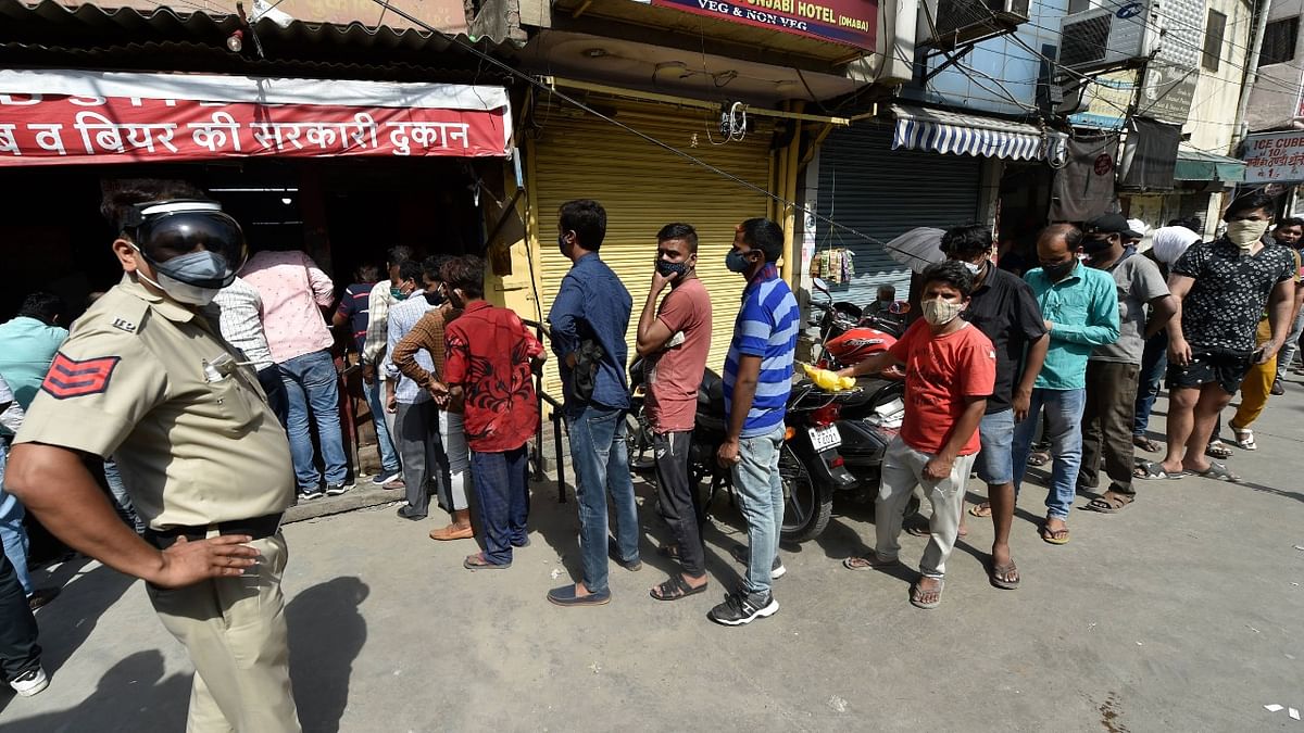 Liquor makers seek home delivery of booze after long queues outside alcohol shops in Delhi