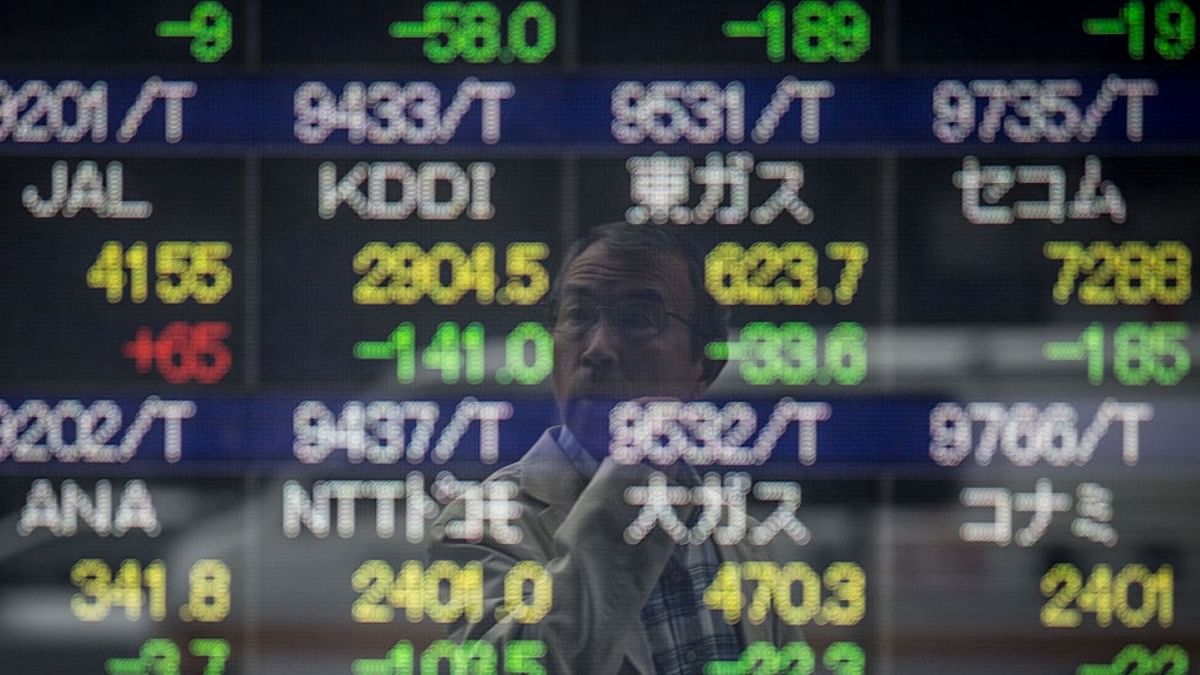 Asian shares mostly higher ahead of Fed meeting
