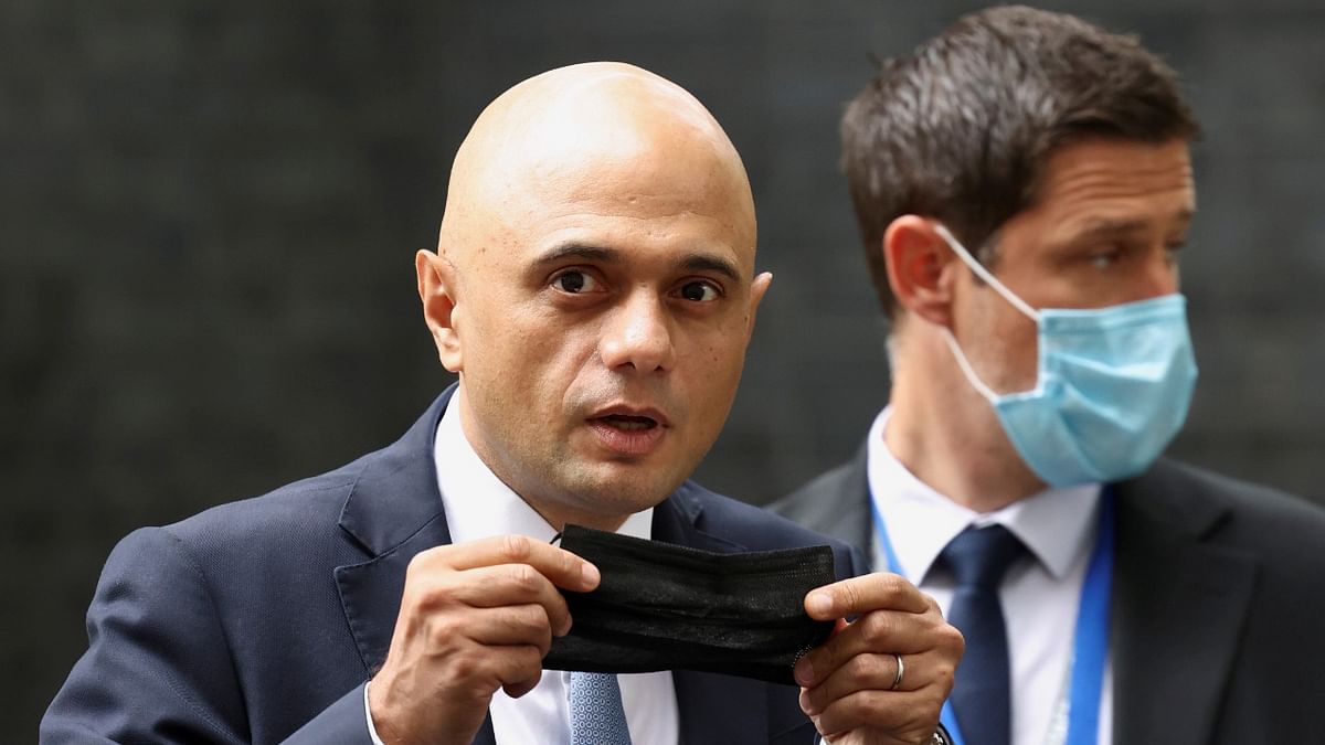 UK's Sajid Javid apologises for urging people not to 'cower from' Covid