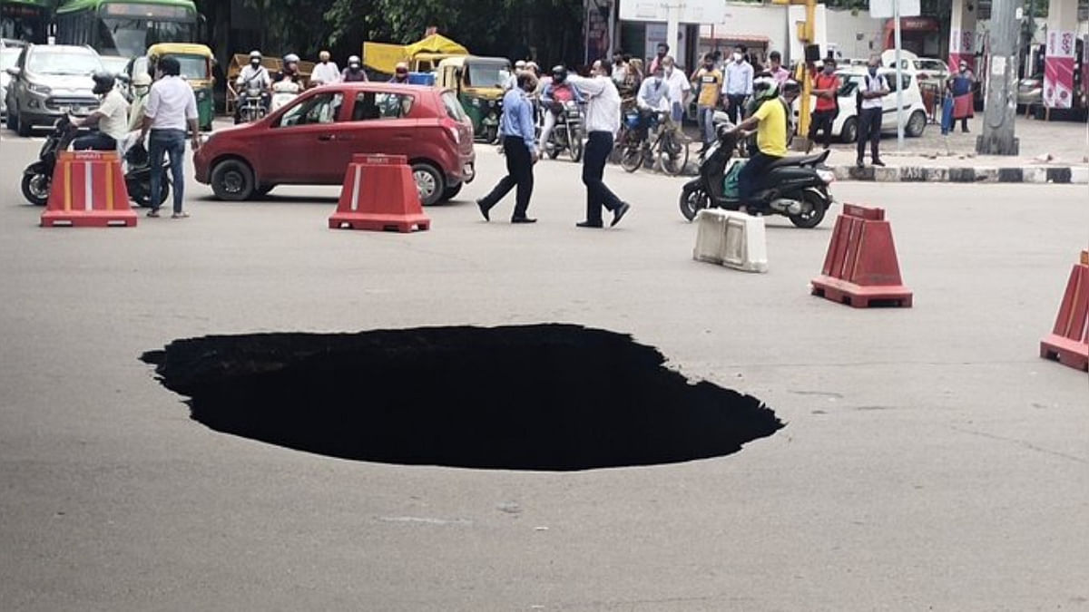 Part of Delhi road under IIT flyover caves in, traffic affected