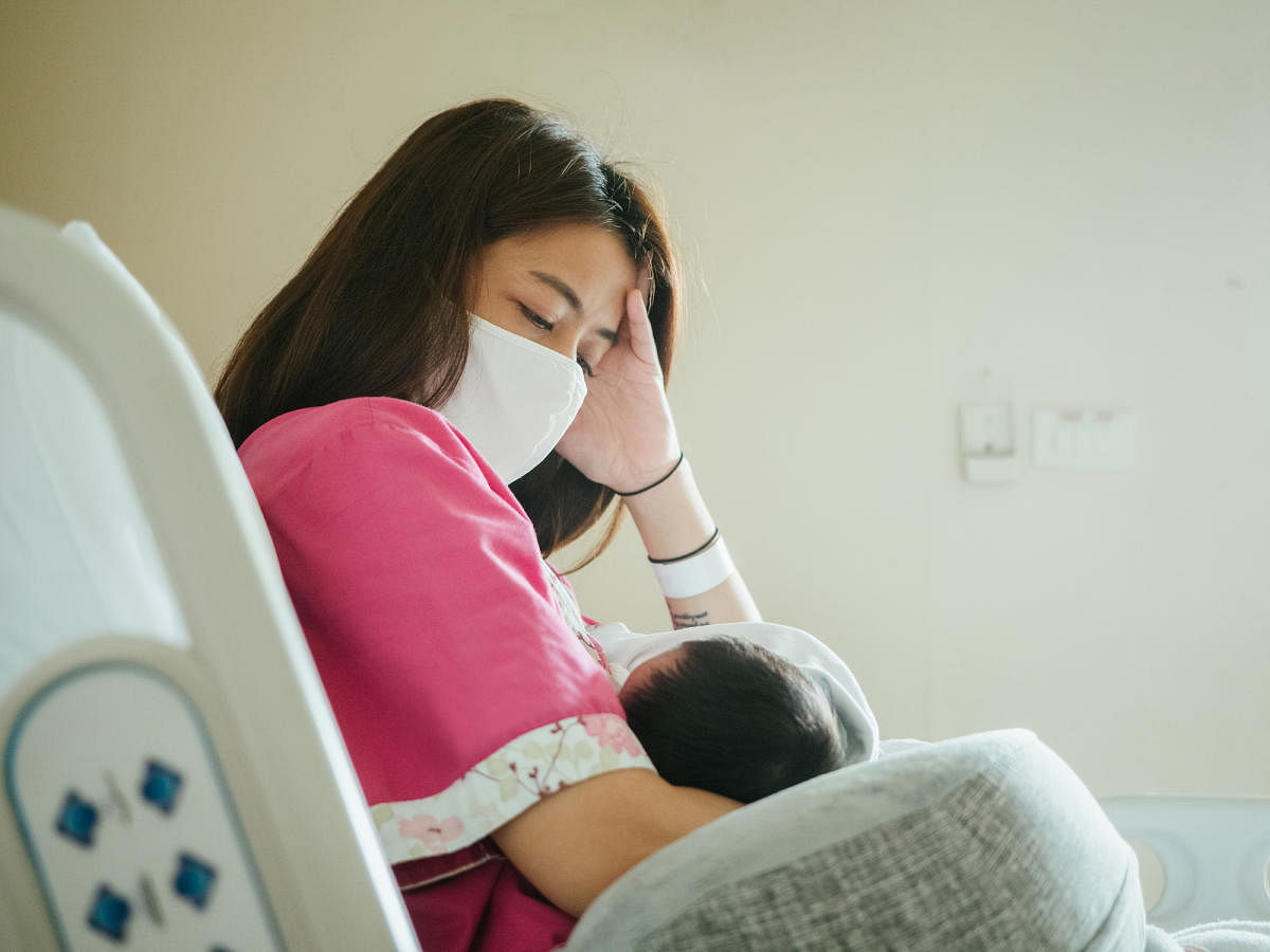 How can a Covid-positive mother nurse her baby?