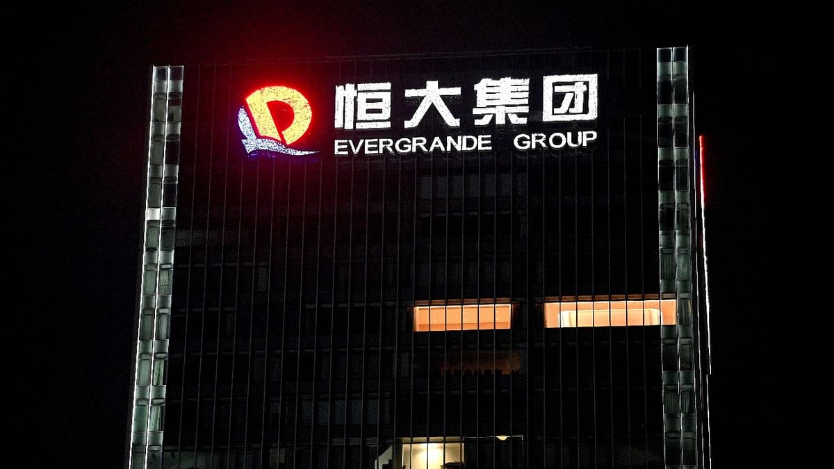 Evergrande's defaults risk rise: Here's what analysts have said