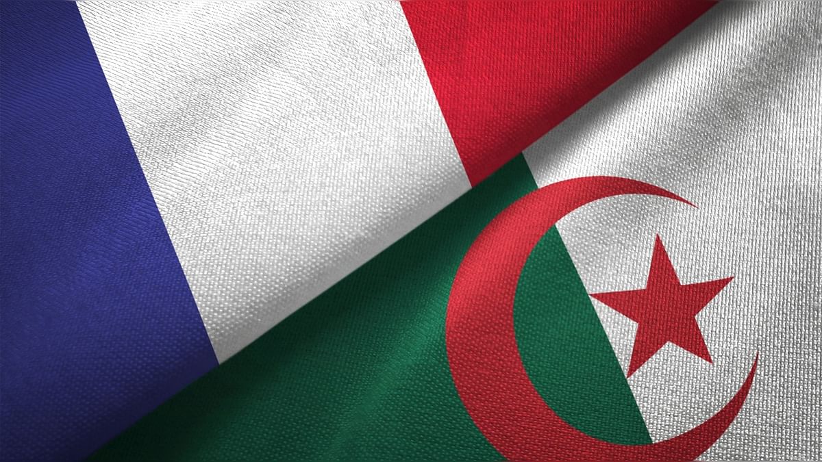 What sparked the latest crisis between France and Algeria?