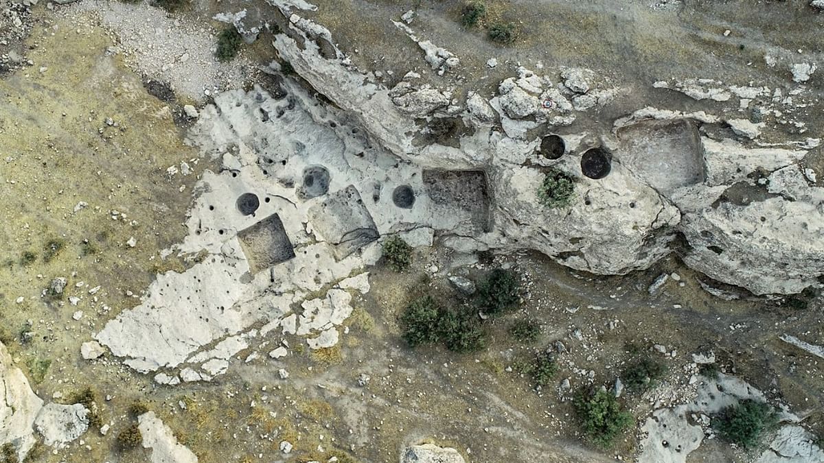 Archaeologists in Iraq find ancient wine press, carvings