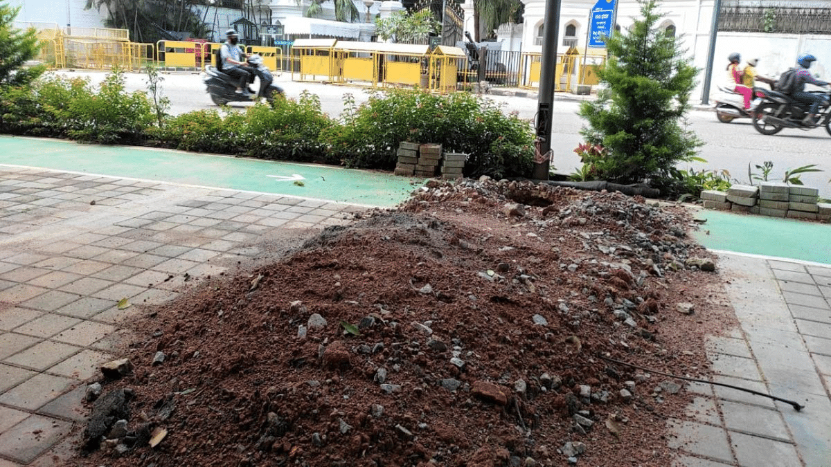 Bescom rips cycle lane, footpath built by Smart City