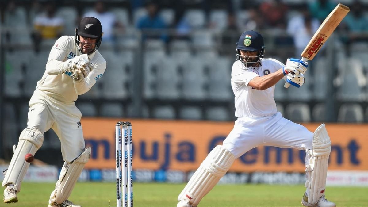 India 142/2 at lunch on Day 3, lead by 405 runs against NZ
