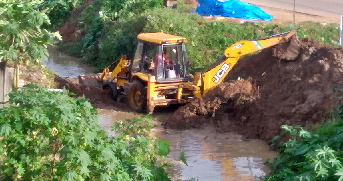 Encroachments on Keerehole, Bypass Road drain being cleared
