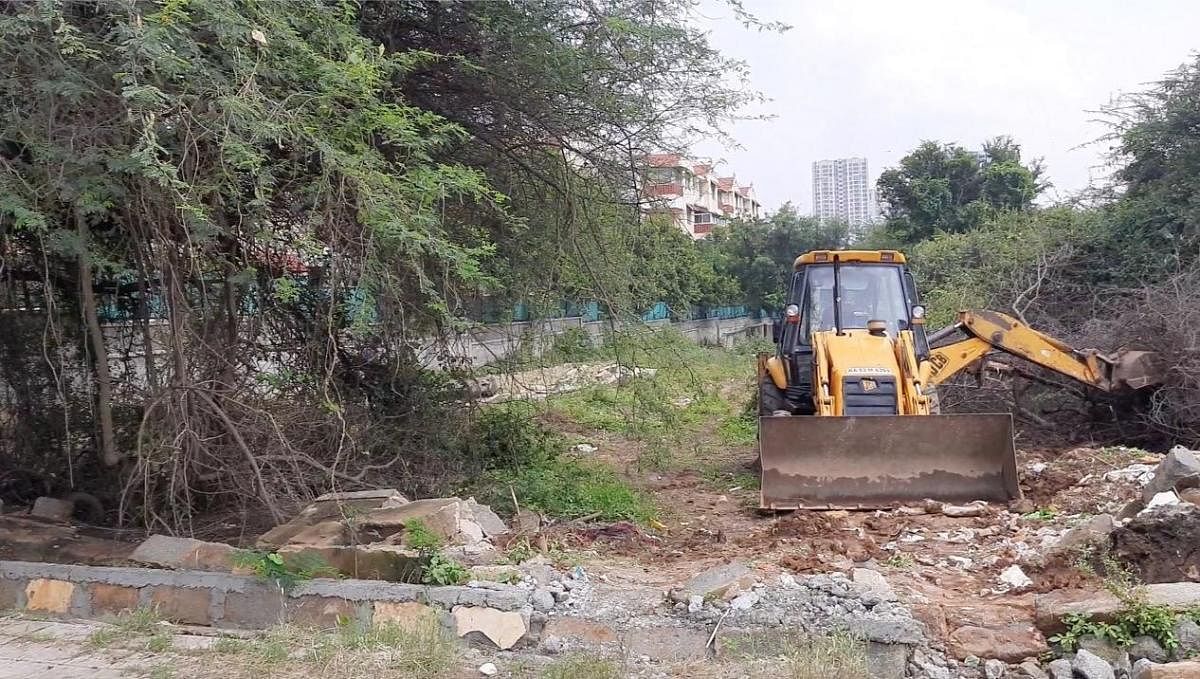 BBMP constructing new road next to lake it had left to die