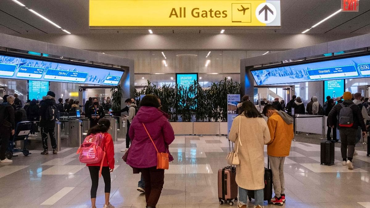 Over 2,300 flights cancelled as Omicron hits holiday travel
