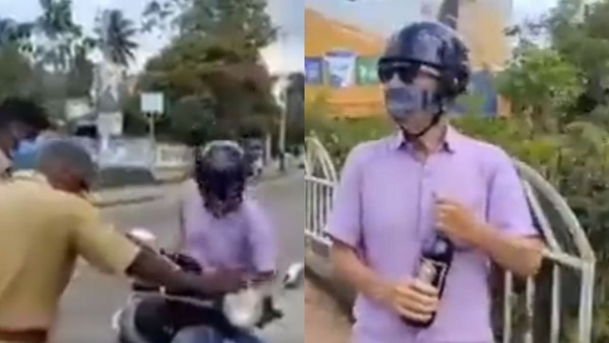 Kerala cop suspended after foreigner pours liquor on road