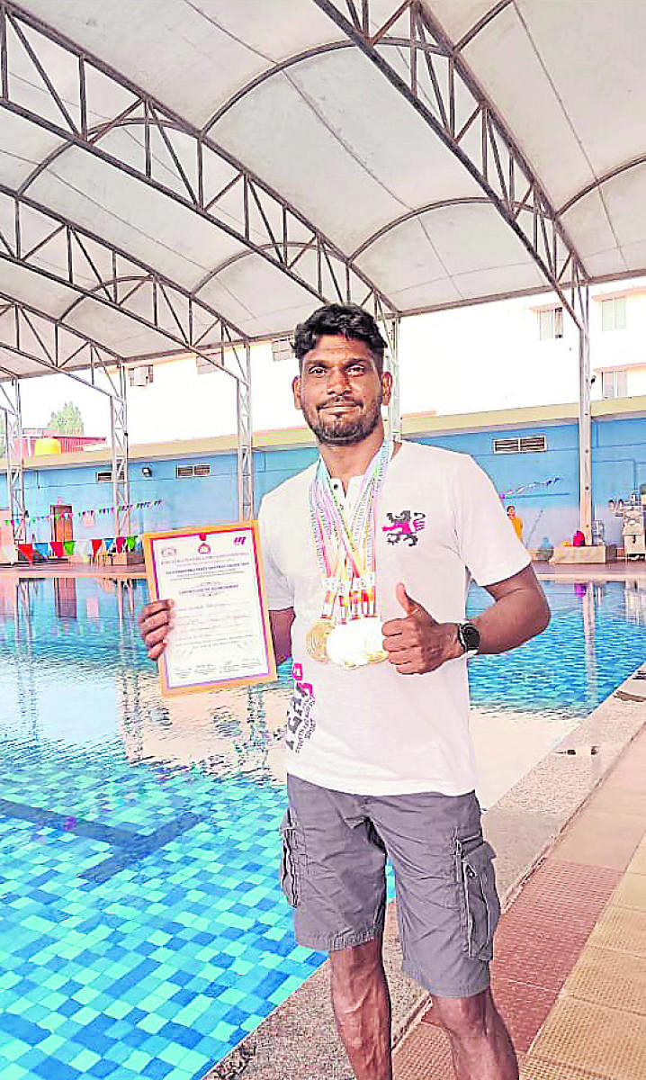 Sandesh Tingalaya wins gold medals in swimming