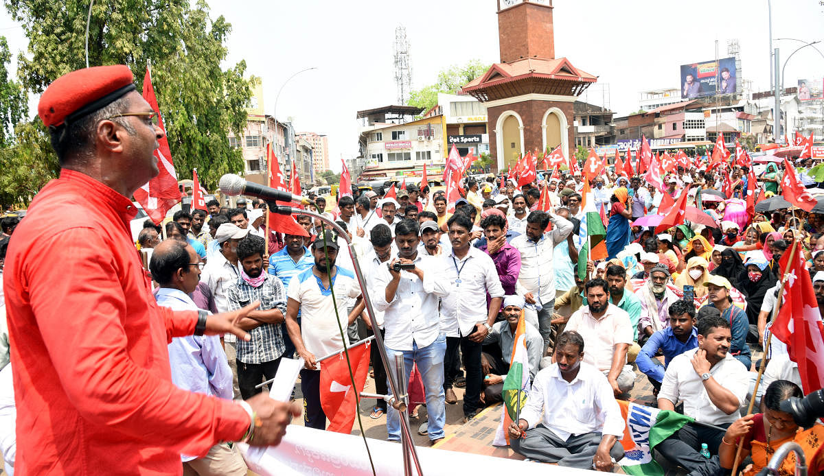 Protesters demand social security for labourers