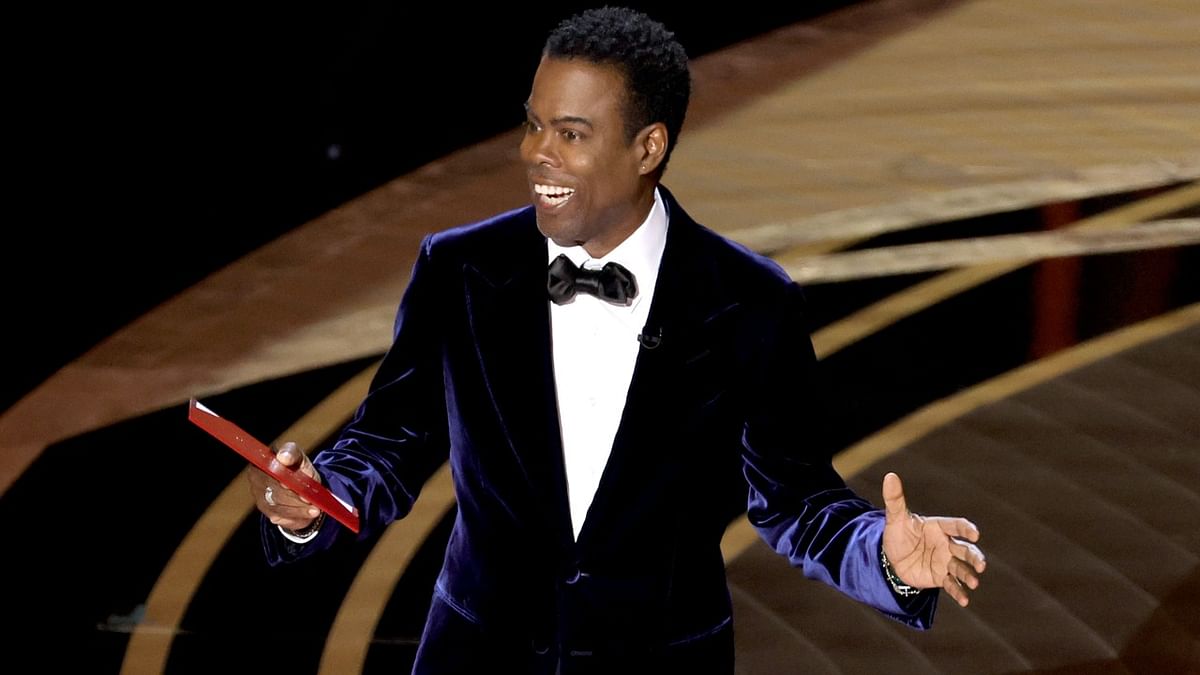 Chris Rock gets standing ovation at comedy show, says will talk about Oscars slap 'at some point'