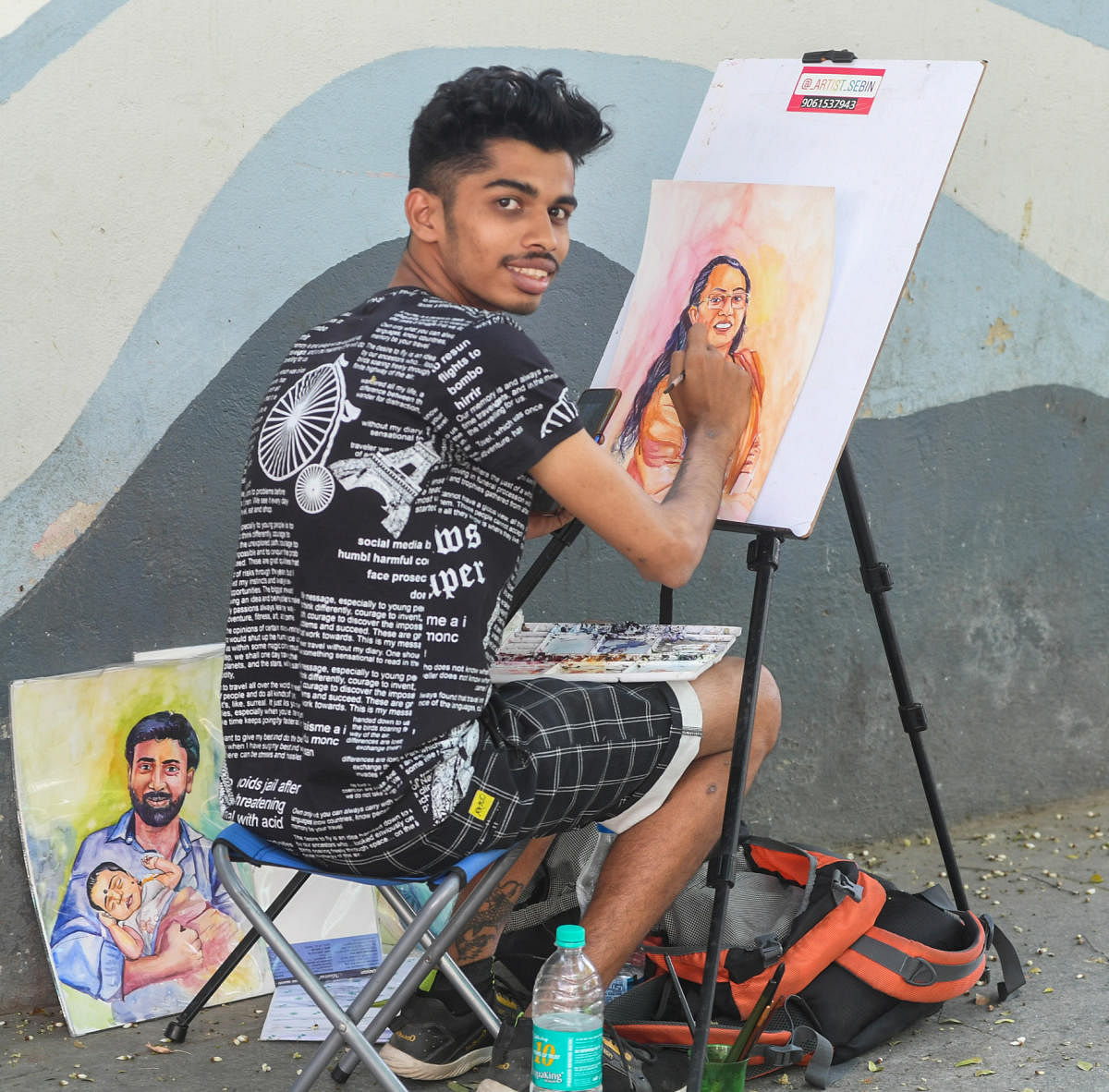 Young Kerala artist draws portraits on Church St