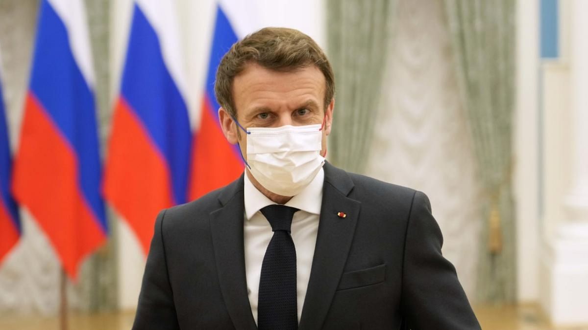 Emmanuel Macron clashes with Marine Le Pen over Islamic headscarf ban