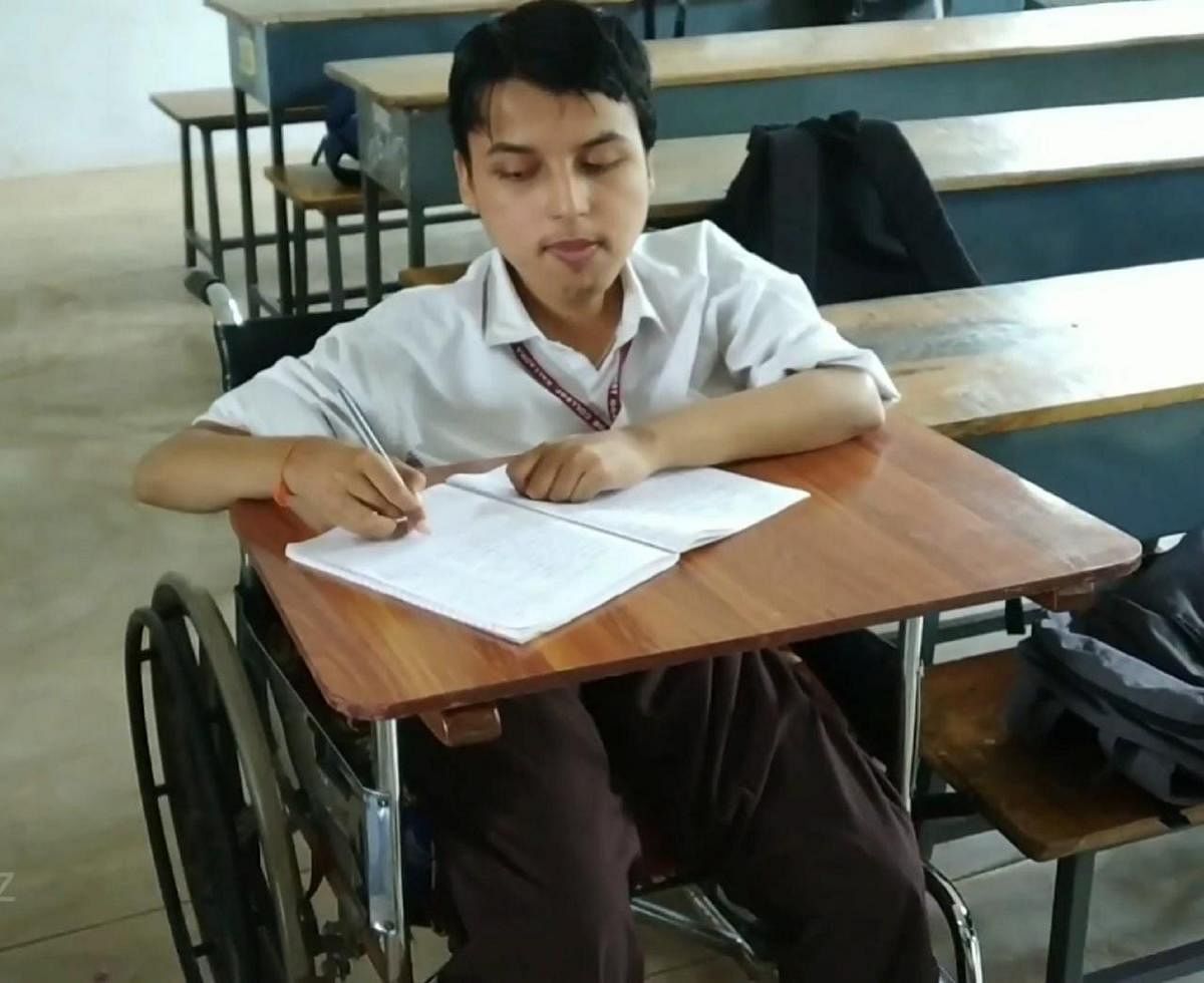 Physical disability not a deterrent for this rank student