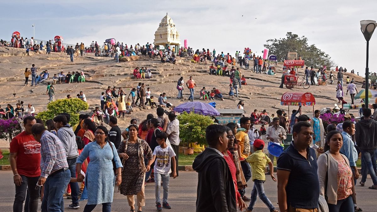 Free of Covid-19 curbs, Bengalureans flock to Lalbagh, Cubbon Park  