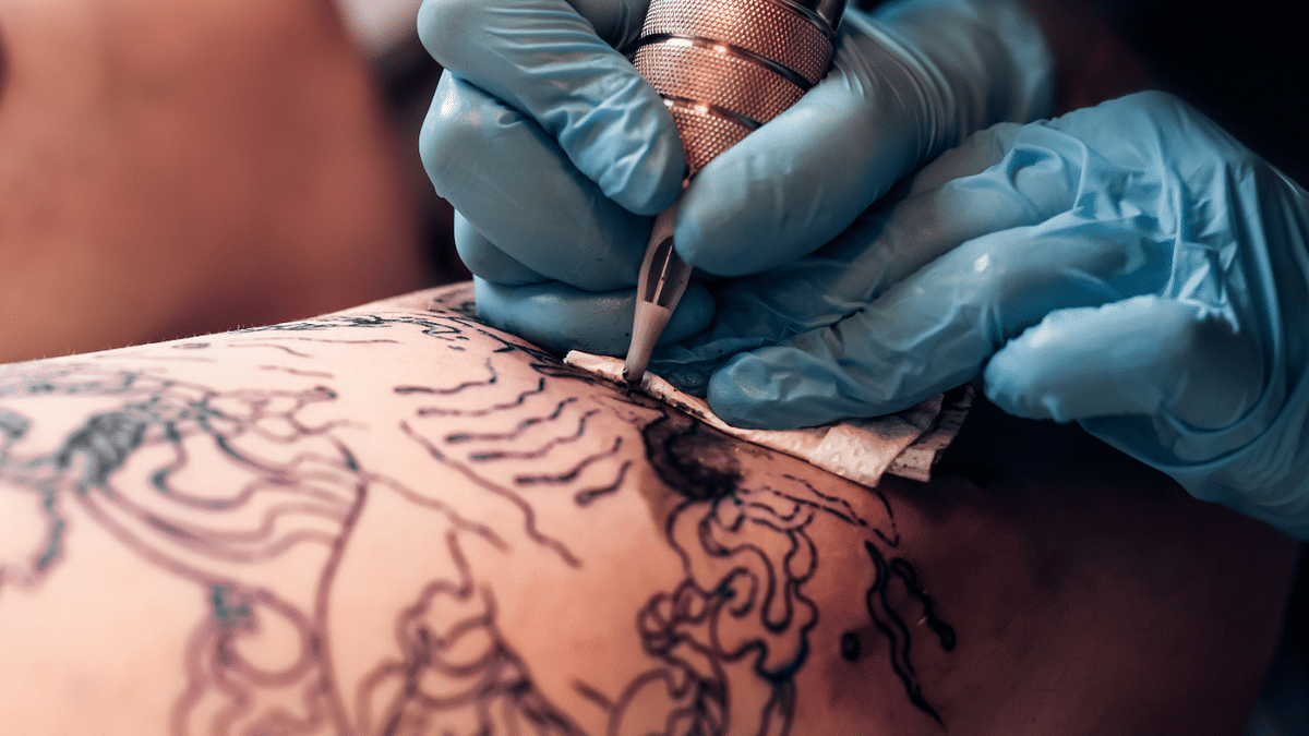 Hand-poked tattoos are in