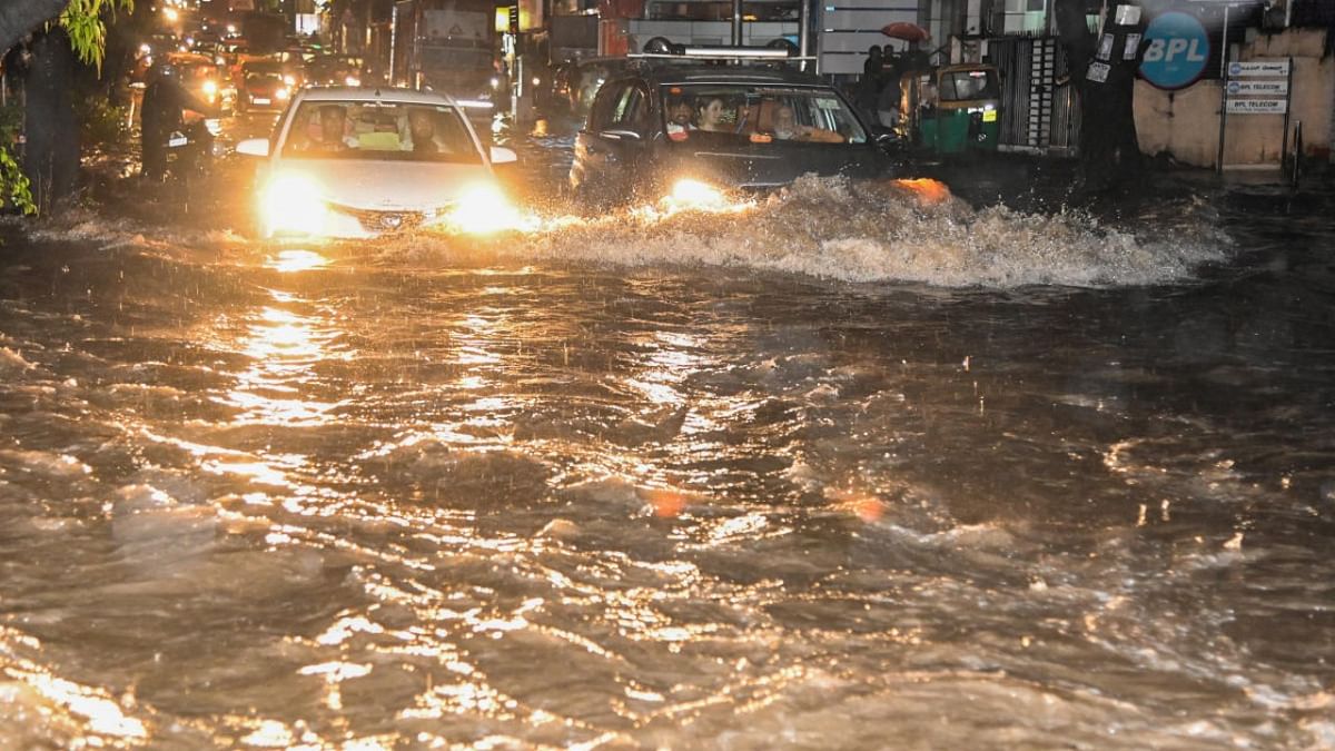 Bengaluru streets turn into pools as city receives heavy rain; orange alert today
