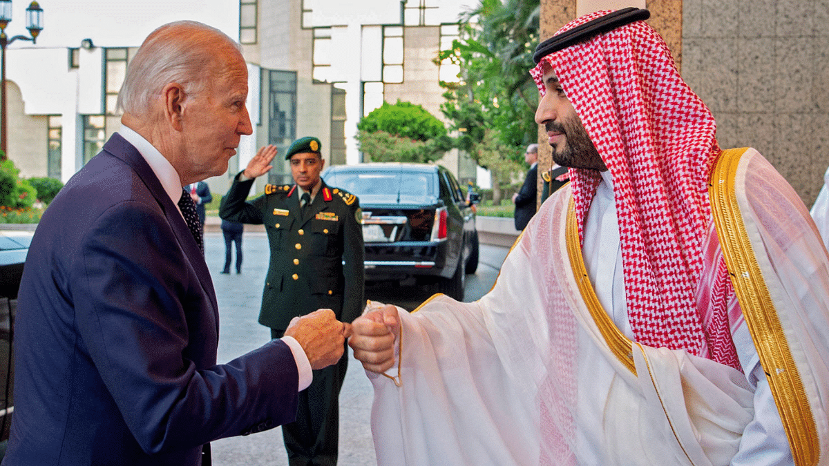 Biden fist bumps Saudi crown prince on trip that seeks to reset ties