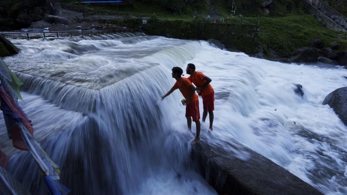 Nepal's holy Bagmati River choked with black sewage, trash