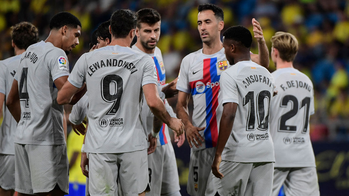 Barcelona hit Cadiz for four to move top of La Liga