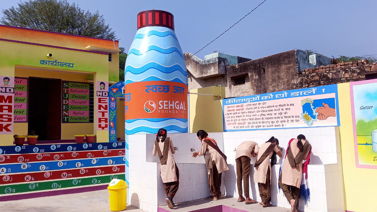 Classrooms like buses and bottle-shaped water tank in Rajasthan's government schools