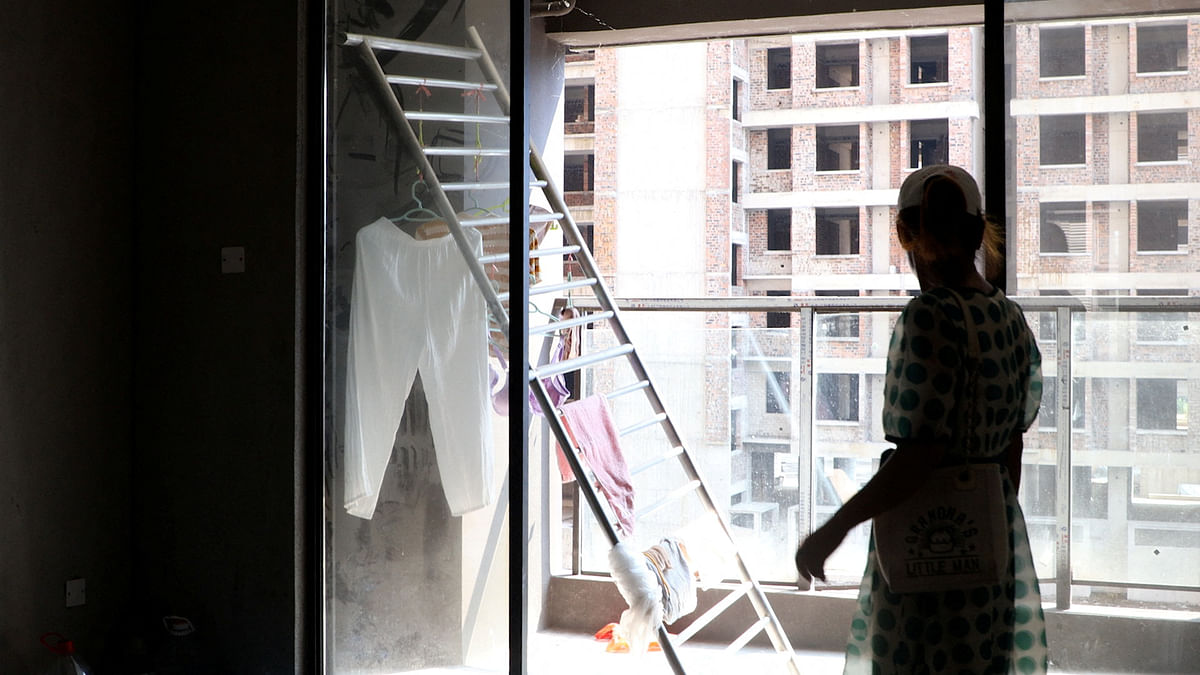 In China, home buyers occupy their 'rotting', unfinished properties