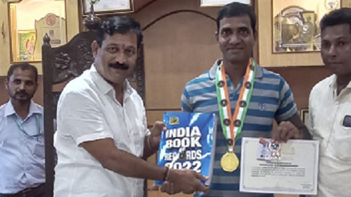 49-year-old man in India Book of Record with 29 underwater somersaults