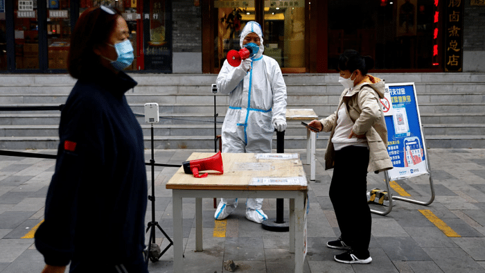 Guangzhou's Covid-19 outbreak deepens as more lockdowns loom in China