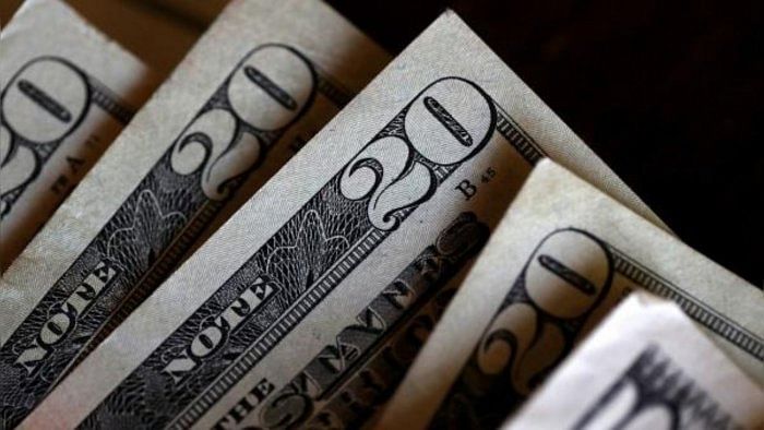 Dollar edges higher as investors look past US midterms to inflation data