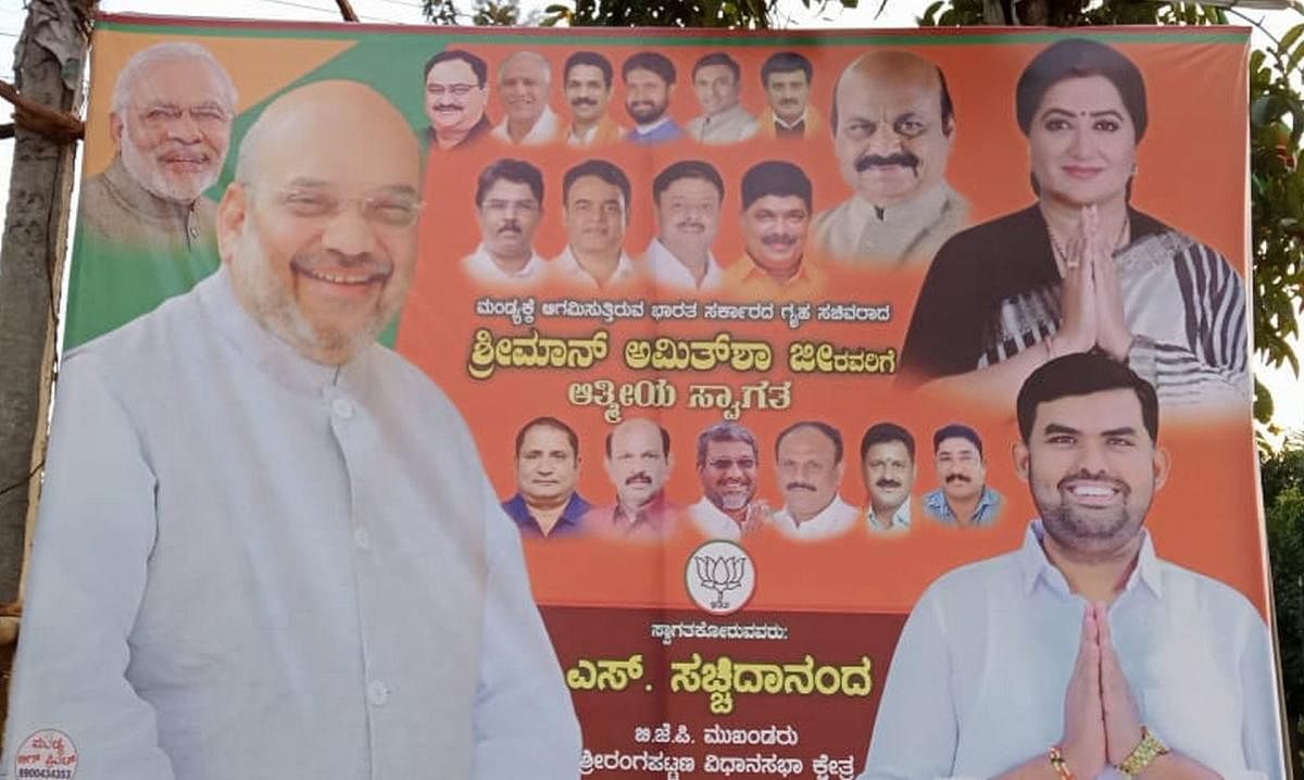 Karnataka: Sumalatha's pics make way into banners to welcome Amit Shah