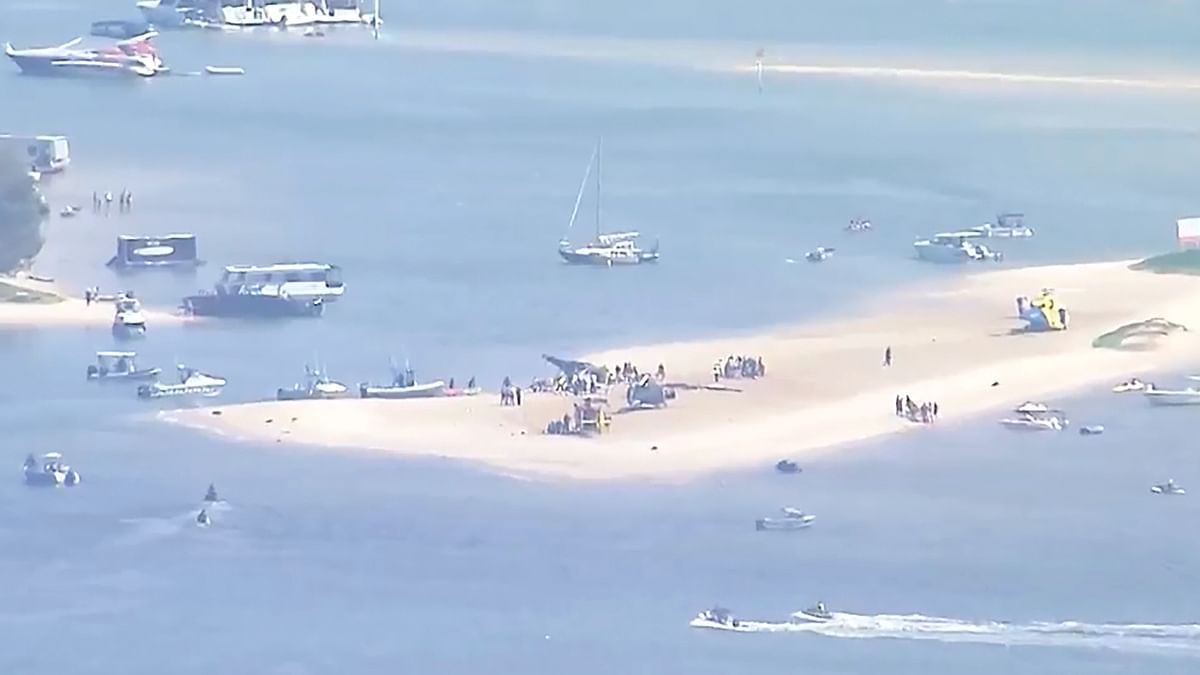 Helicopters collide over Australian beach, passengers hurt