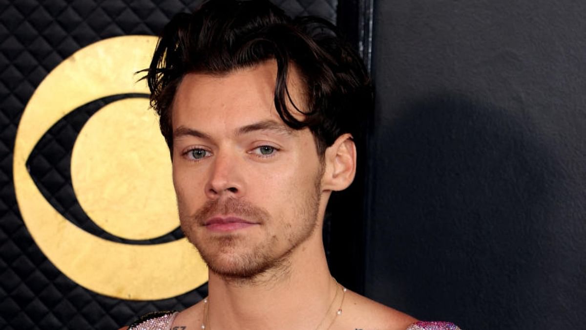 Harry Styles teases One Direction reunion as he posts gym selfie